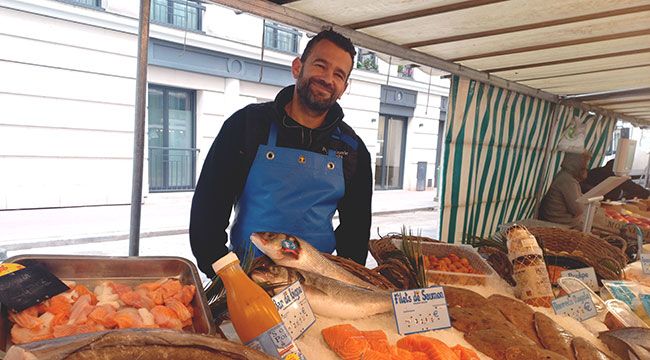 Photo de commerçant sur un marché